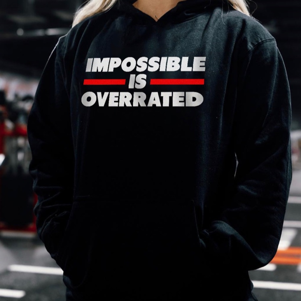 Brand new UNISEX Hoodie  “IMPOSSIBLE IS OVERRATED “